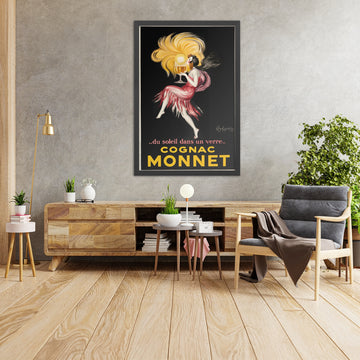 A framed image of Cognac Monnet Vintage Cognac Poster by Leonetto Cappiello, 1927