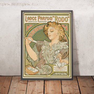 A framed image of Lance Parfum Rodo by Alphonse Mucha, 1896