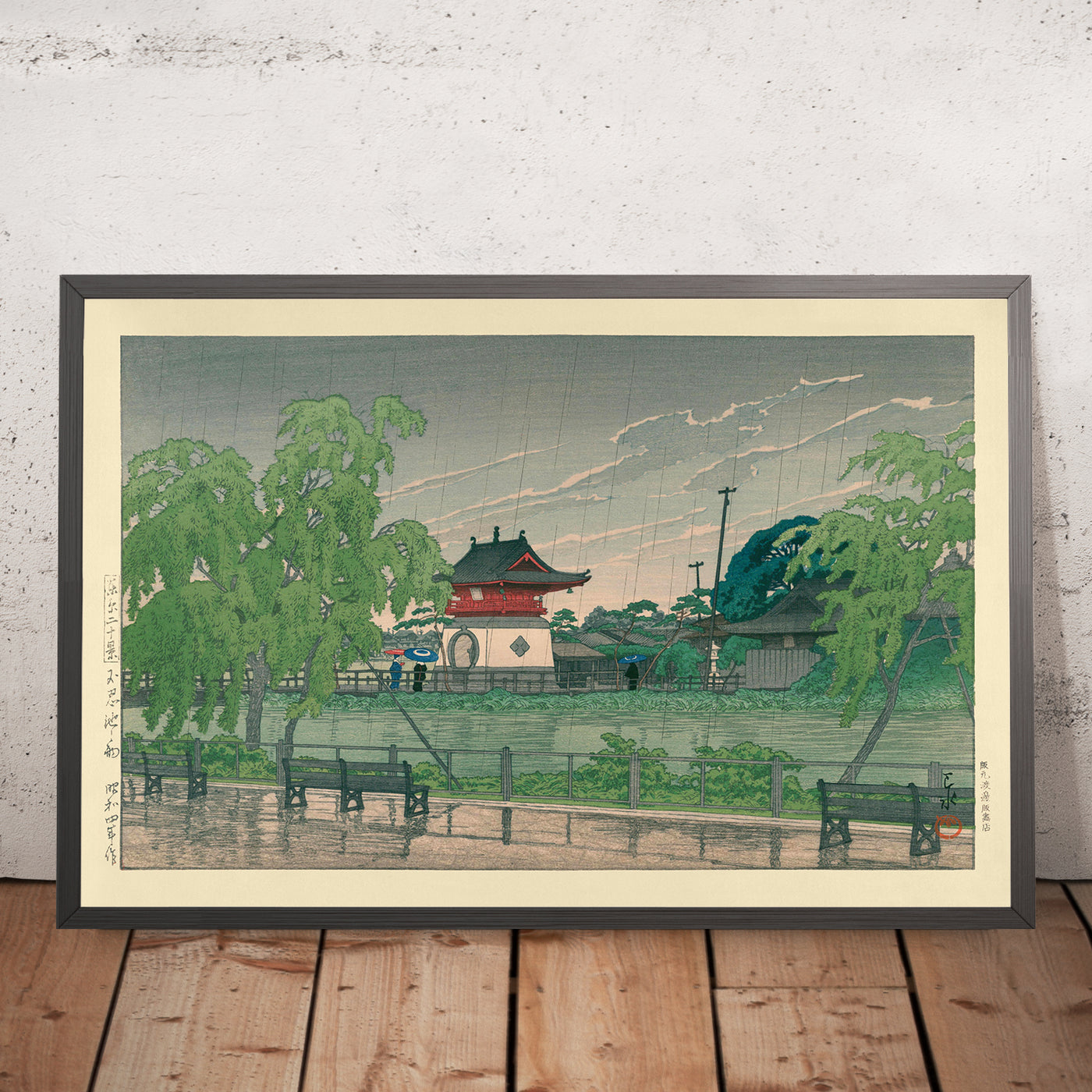 A framed image of Rain at Shinobazu Pond by Hasui Kawase, 1935