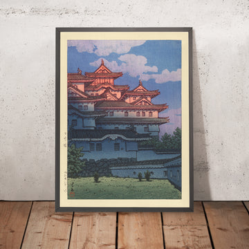 A framed image of Sunset at Shirasagi Castle by Hasui Kawase, 1935