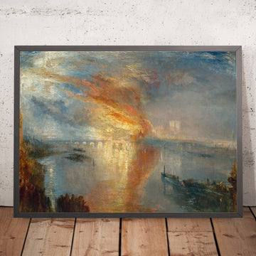 A framed image of The Burning of the Houses of Lords and Commons 16 October 1834 by Turner 1835