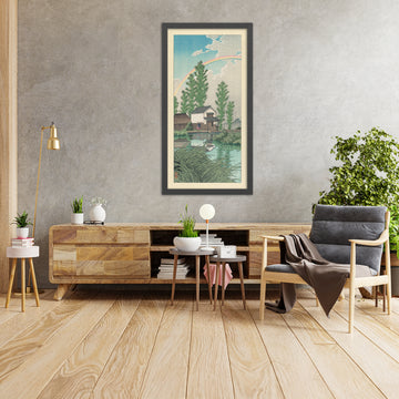 A framed image of Summer at Itako with Rainbow by Hasui Kawase, 1935