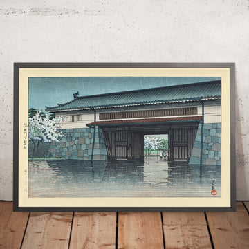 A framed image of Spring Rain at Sakurada Gate Tokyo by Hasui Kawase 1935